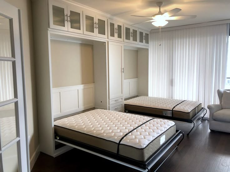 2 Murphy beds in a wall unit